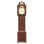 A George III mahogany cased long cased clock, with urn finial and broken pediment, over a domed