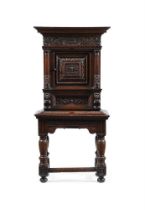 A Dutch oak and ebony cabinet on stand, 17th century and later elements, 84cm wide, 47cm deep, 173cm