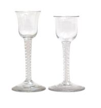 An 18th century opaque twist wine glass, with a floriform bowl supported on a double series stem and