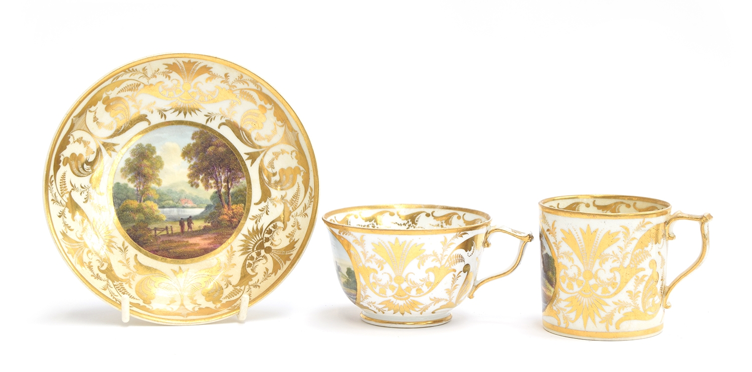 An early 19th century Derby named view teacup, coffee cup and saucer, the cups hand painted with a - Image 2 of 12