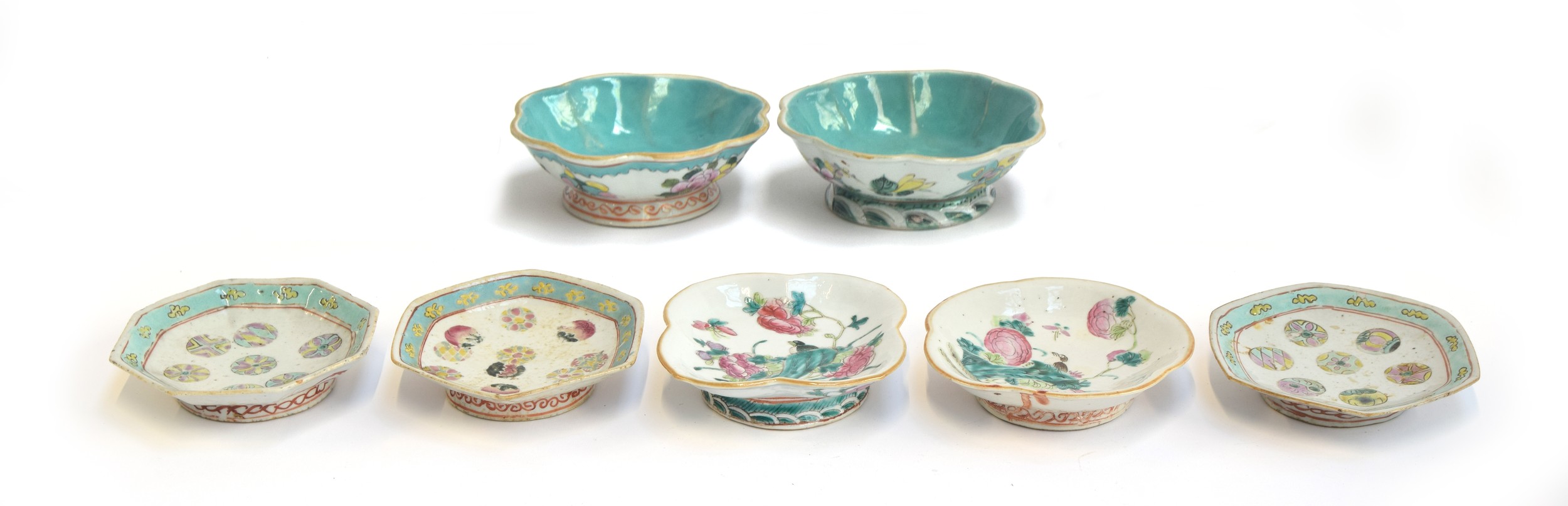 A collection of seven late 19th/early 20th century Chinese porcelain footed bowls, two of lobed