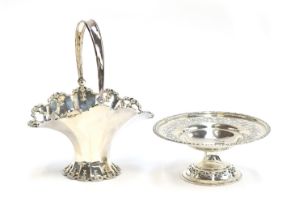 An Edwardian silver swing handled basket by William Comyns & Sons, London 1907; together with a