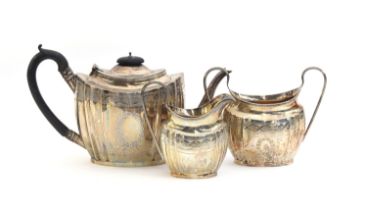 A George V three piece teaset by George Nathan & Ridley Hayes, Chester 1908 and 1911, with bright