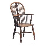 A 19th century yew and elm high splat back Windsor chair, on triple ring turned legs with