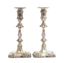 A pair of George III style silver candlesticks by I.S. Greenberg & Co., Birmingham 1902, with