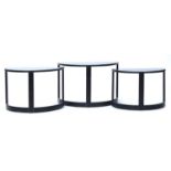 Three black ash demilune nesting side tables, 74cm wide, 41cm deep, 48.5cm high