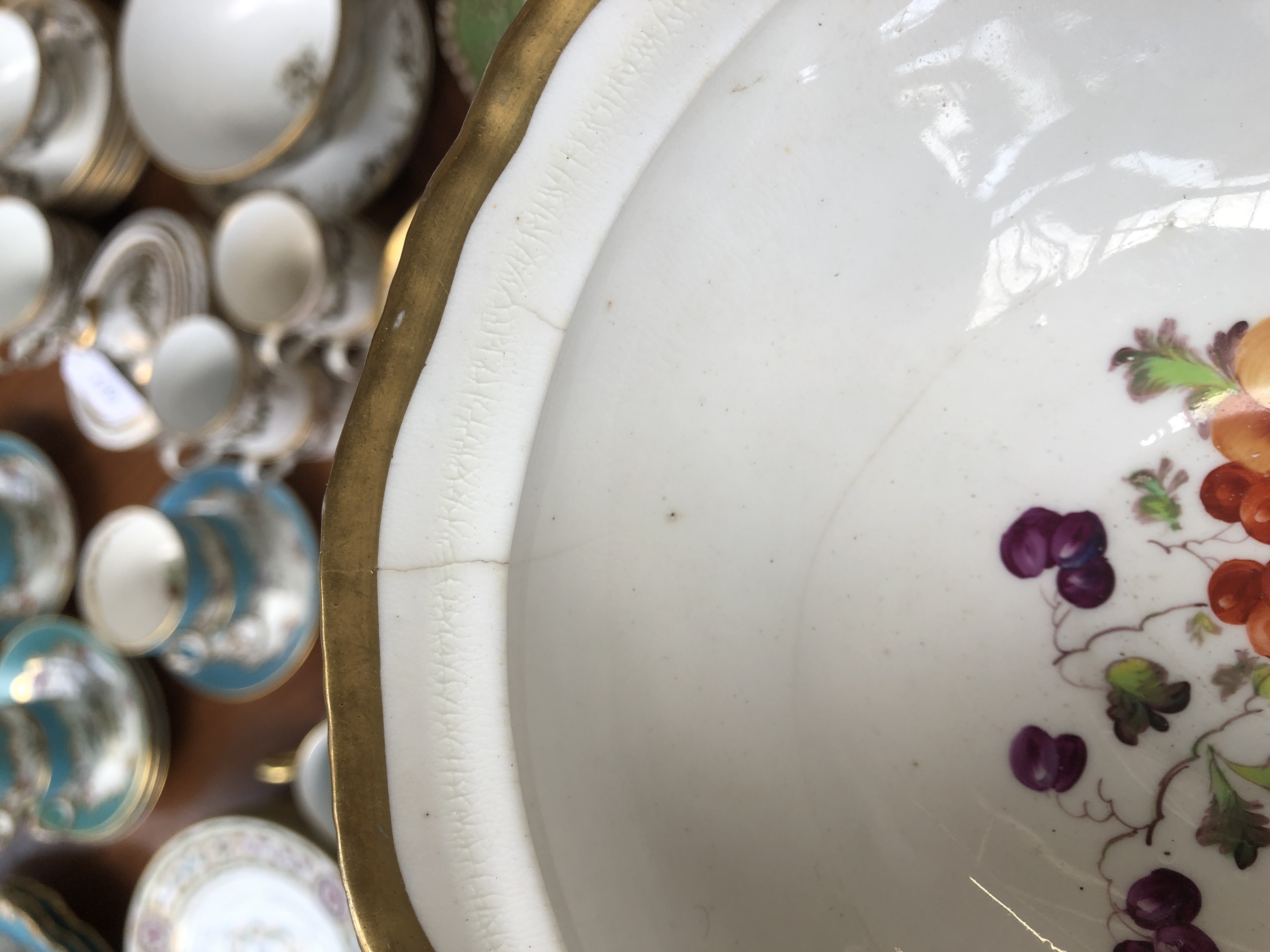 A 19th century hand painted dinner service, floral panels on a green ground, heightened in gilt, - Image 8 of 10