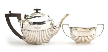 A George V silver teapot and sugar bowl by Charles Boyton & Son Ltd, London 1910 and 1911, the