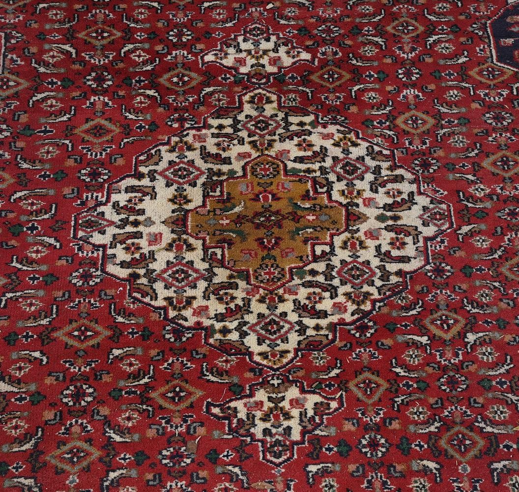 A North West Persian carpet, with red ground, approx. 350x260cm - Bild 2 aus 2