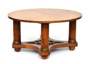 A walnut and ormolu circular coffee table, with shaped undershelf 108cm diameter, 55cm high