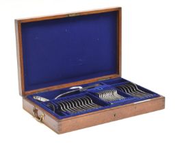 An oak cased canteen of Old English pattern silver flatware by Carrington & Co, London 1897,