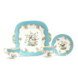 A late 19th/early 20th century porcelain tea set, 30 pieces, each hand painted with a variety of