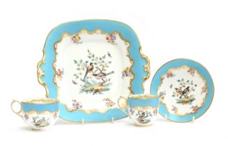 A late 19th/early 20th century porcelain tea set, 30 pieces, each hand painted with a variety of