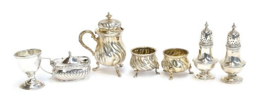 A mixed lot of silver cruets, to include an .800 silver continental three piece set with spirally