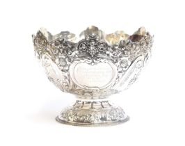 An Edwardian silver trophy bowl by Atkin Brothers, Sheffield 1903, chased with scrolls and swags,.