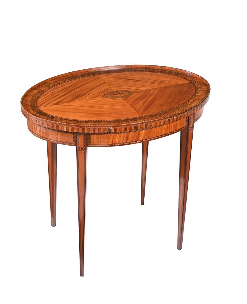 A 19th century Dutch satinwood and tulipwood banded occasional table, the top inset with a central