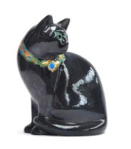 An Emaux de Longwy figure of a seated cat, gilt and gun metal glaze, marked to base, 28cm high