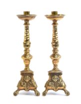 A pair of late 18th/early 19th century European brass candlesticks, later nozzles, 35.5cm high