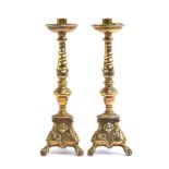 A pair of late 18th/early 19th century European brass candlesticks, later nozzles, 35.5cm high