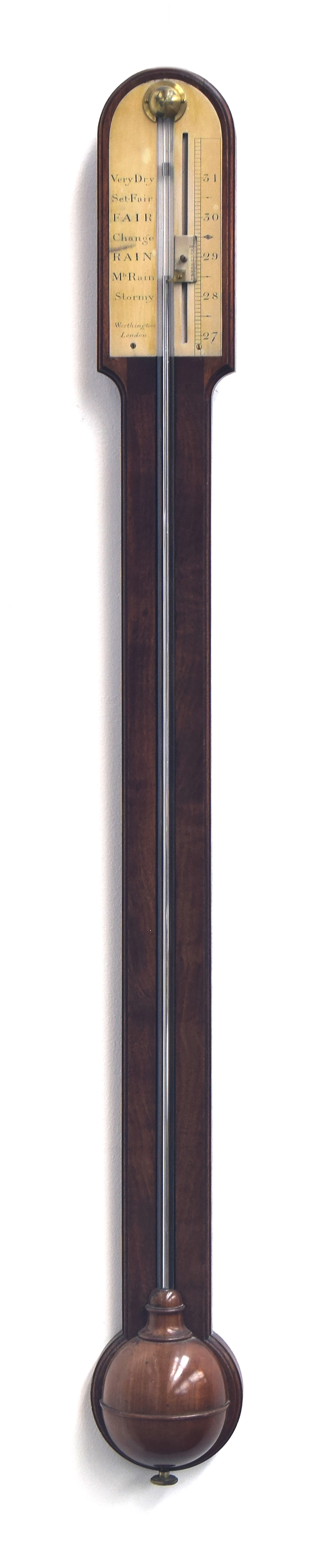 An 19th century Worthington of London mahogany stick barometer, domed top above a circular