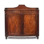 A Regency mahogany and ebony strung bowfront cabinet, three quarter gallery over a leather inset