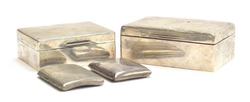 Two silver cigarette boxes, one by William Comyns & Sons, London 1943, the other marked Sterling