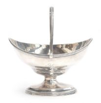 A George III silver swing handled navette shaped sugar bowl by Crispin Fuller, London 1794, 14cm