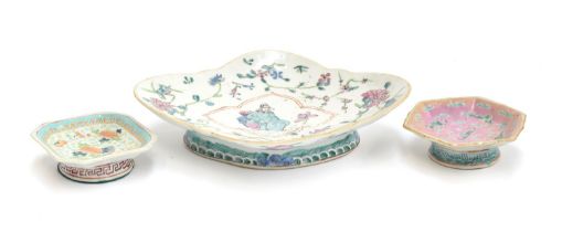 A Chinese quatrefoil form famille rose dish, painted with a noble surrounded by a border of flora