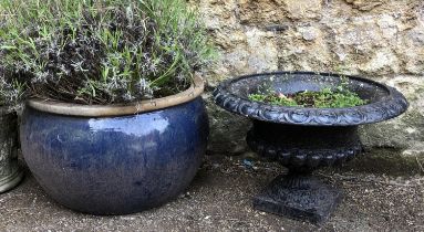 A large blue glazed ceramic planter, approx 32cmH 56cmD; together with a cast metal urn planter,