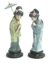Two Lladro Japanese Geisha figurines: 'Oriental Spring', model no. 4988, and 'Sayonara', model no.