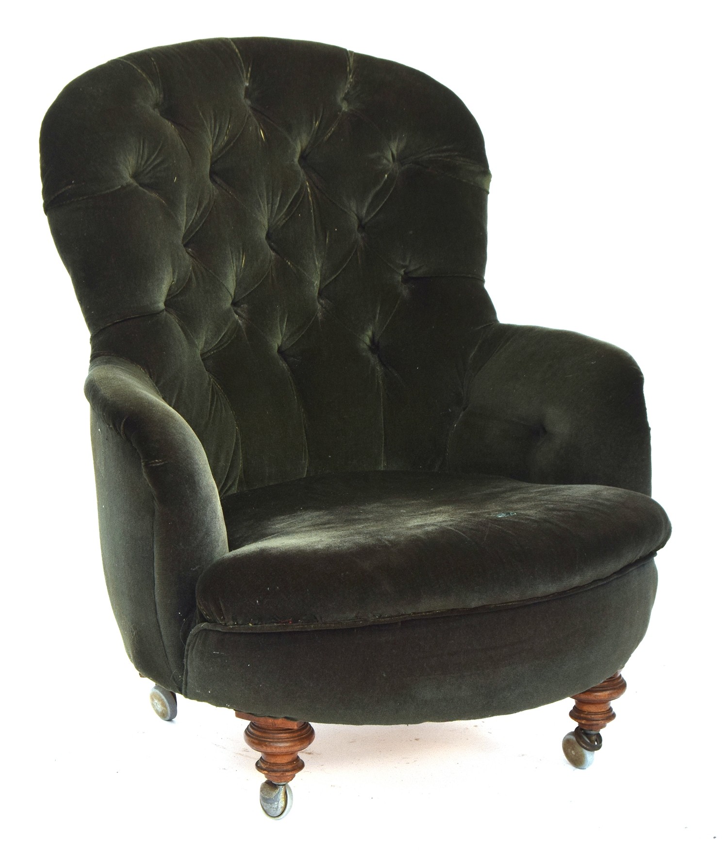 A Victorian buttonback armchair by Cornelius V Smith, on turned front legs, one back leg stamped