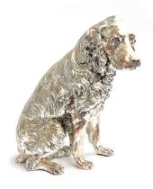 A very large silver painted resin statue of a spaniel, 42cmH