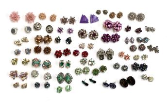 A quantity of costume clip on earrings, some purple and green tone, aurora borealis crystal etc