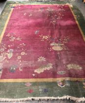 A very large wool rug, deco flowers, burgundy with green border, approx 360x272cm