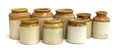 A lot of eight stoneware jars, the tallest 23cmH