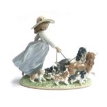 A Lladro porcelain figurine 'Puppy Parade', Figure Group No 6784, 23cm high