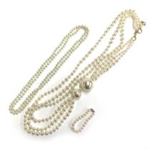 A large oversized faux pearl necklace, the largest pearl 3.9cmD; a cultured pearl bracelet with