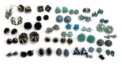 A quantity of costume clip on earrings, mainly blue and black tone
