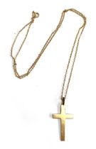 A 9ct gold chain, 1.6g; together with an 18ct gold crucifix, engraved '6th March 1938', 3.4cmL, 2.7g
