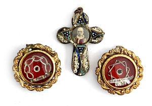 Two reliquary pendants, one Maria Goretti, both with certificates of authenticity; together with a