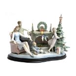 A Lladro figure group, 'Family Christmas', numbered 372/750, sculpted by Francisco Polope, decorated