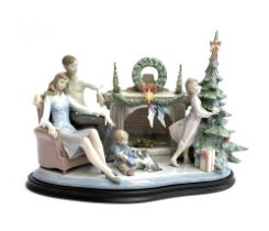 A Lladro figure group, 'Family Christmas', numbered 372/750, sculpted by Francisco Polope, decorated
