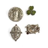 Four brooches: An early 20th century silver Connemara marble clover brooch, A silver Arts and Crafts