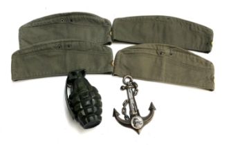 Four West German Garrison caps, together with a money box in the form of a grenade, and an anchor
