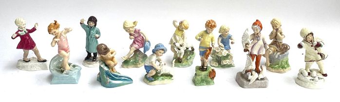 A complete set of 12 Royal Worcester 'Months of the Year' children figurines, modelled by Freda