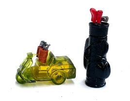 Two novelty Avon 'Wild Country' scent bottles, in the form of golf cart and golf club bag