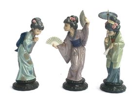 Three Lladro figures of Japanese Geishas: 'Madame Butterfly', model no 4991, 'Sayonara', model no.