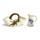 A Royal Worcester porcelain bamboo basket, 26cmL; together with a small Royal Worcester jug (2)