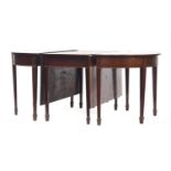 A George III mahogany and satinwood banded D end dining table, the central section with two drop