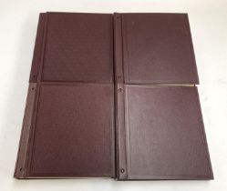 A large quantity of definitive and commemorative stamps in four burgundy Devon albums, Victorian